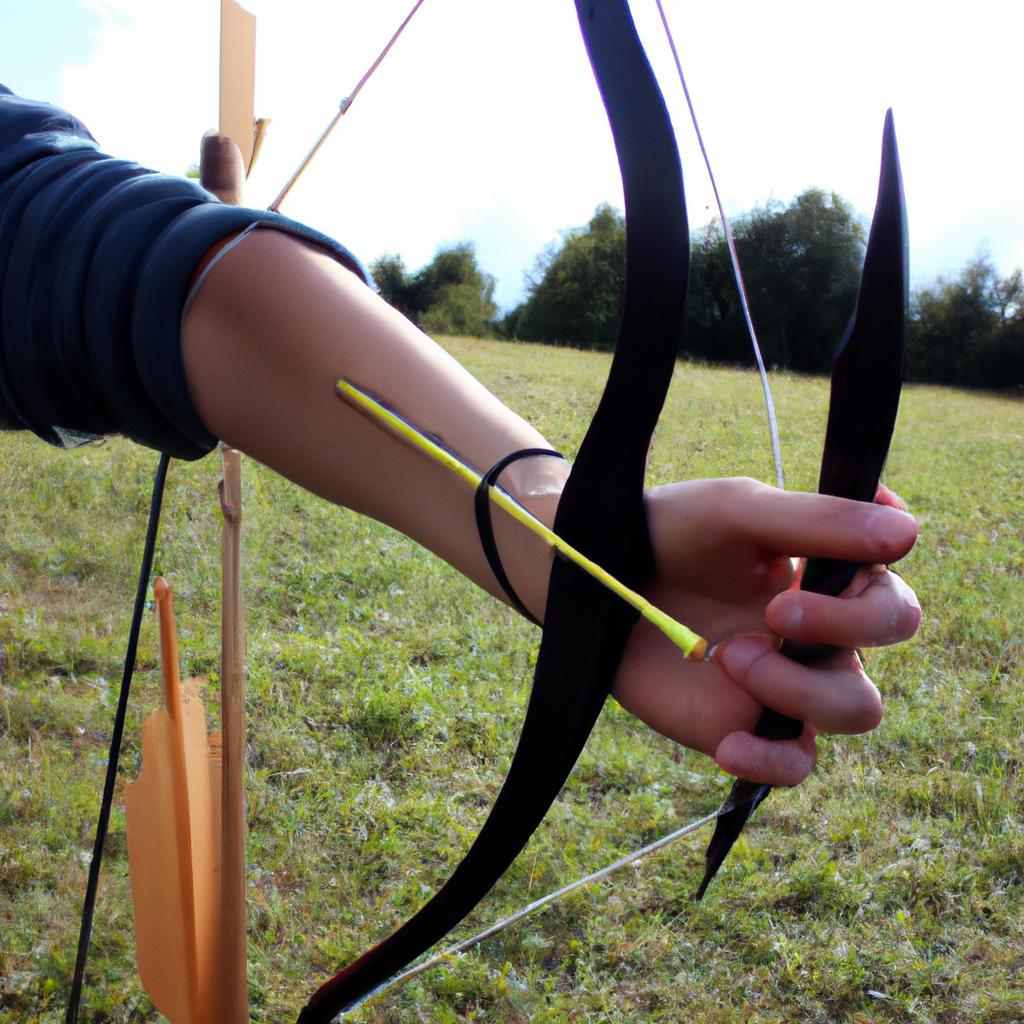 Person holding bow, aiming arrow