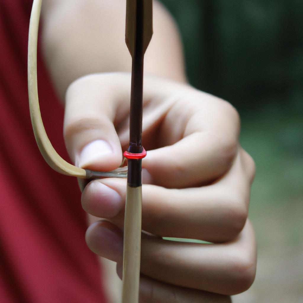 Person holding a bowstring correctly