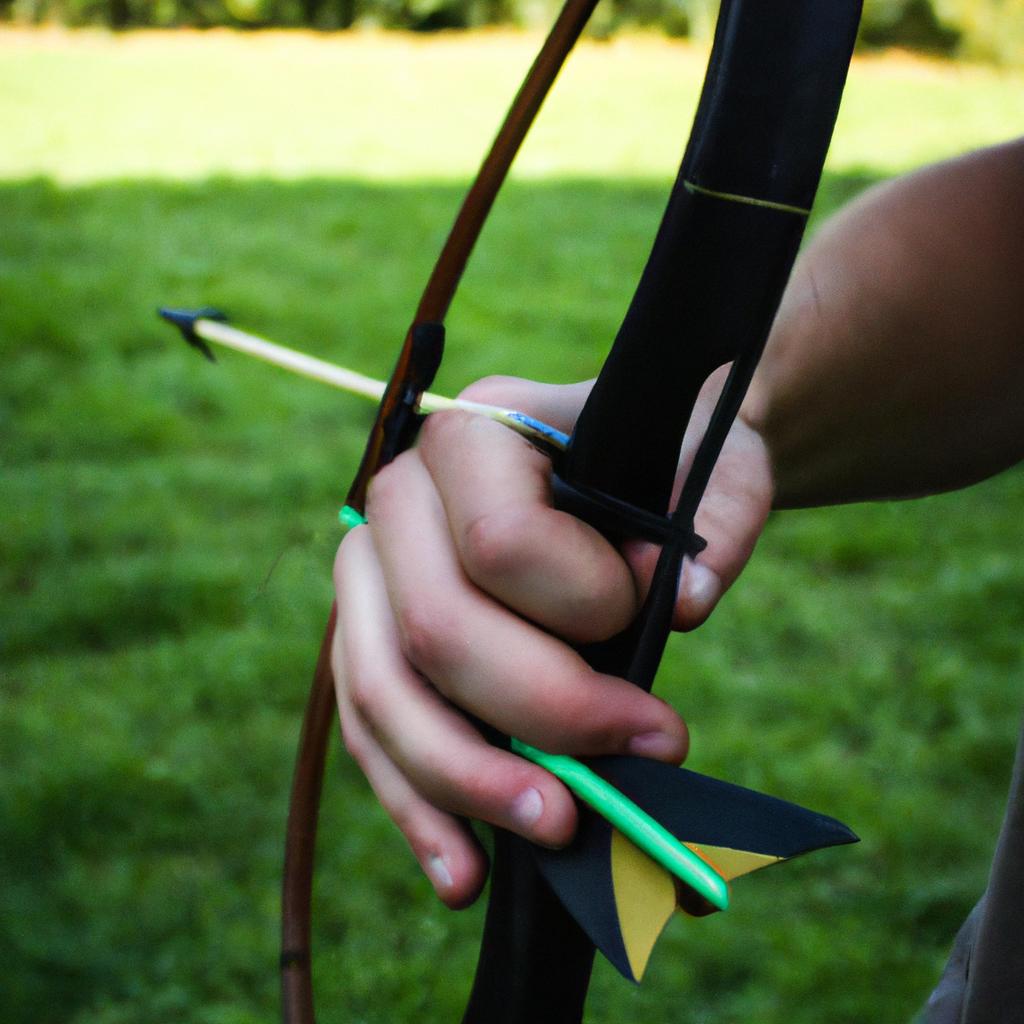 Person adjusting archery bow grip