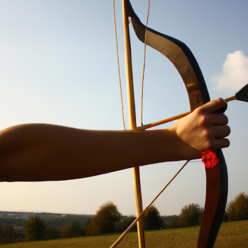 Person holding bow and arrow