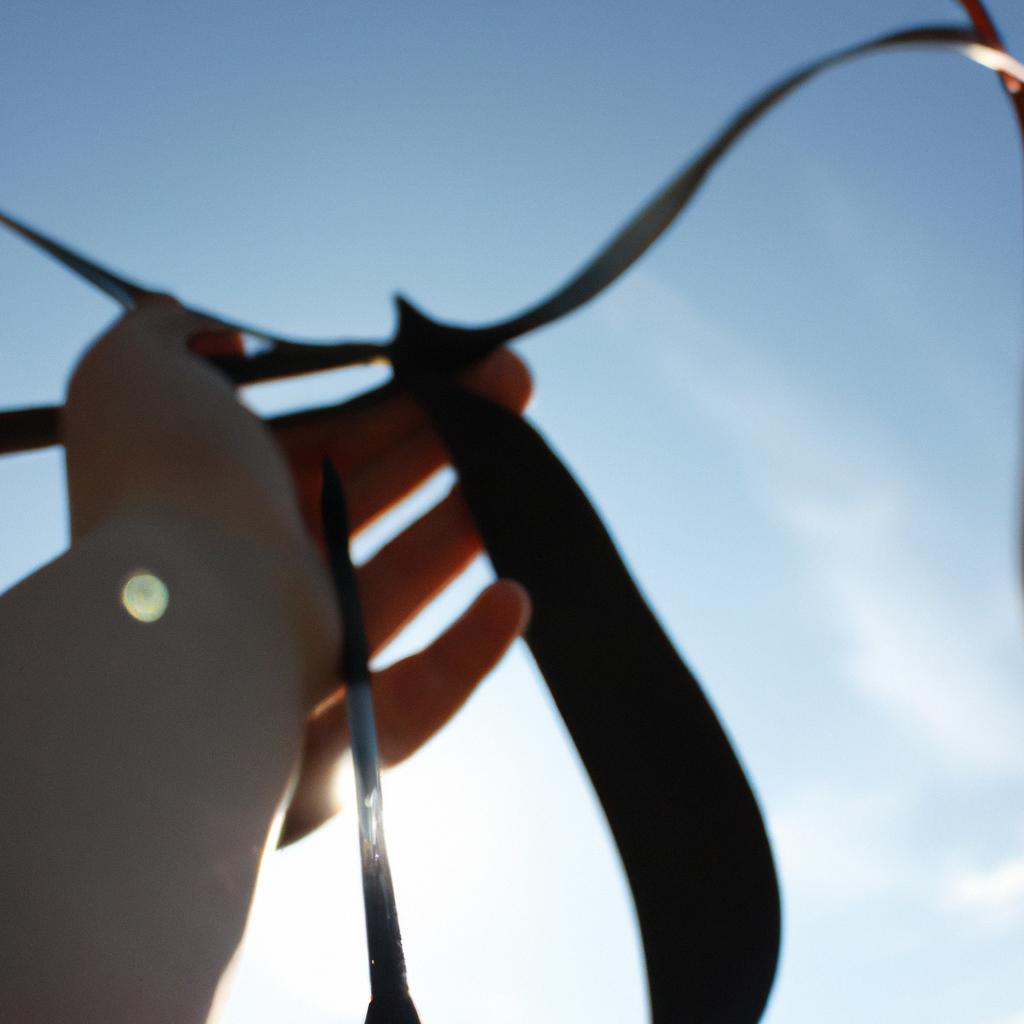Person holding a nylon bow